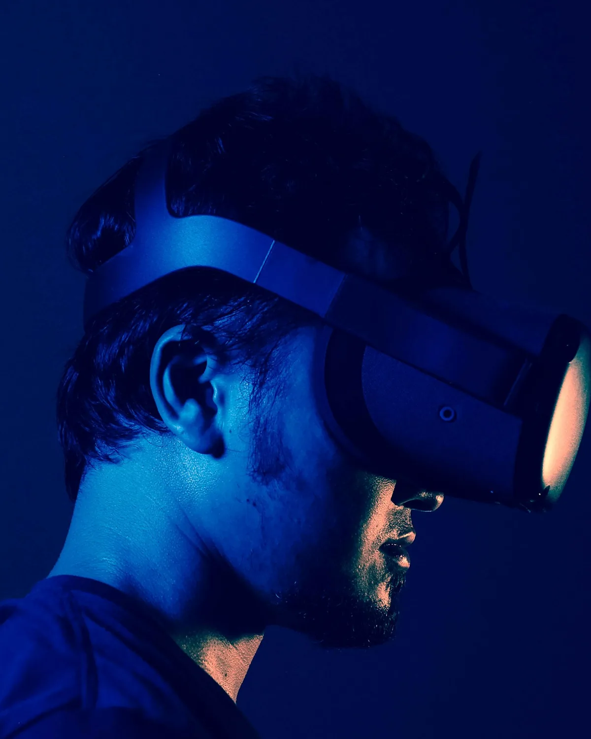 A person in profile wearing a virtual-reality headset