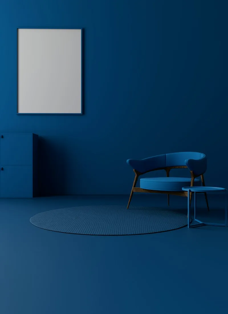 A blue armchair in a blue room